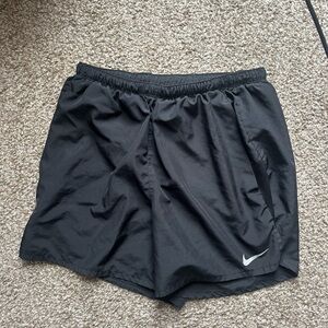 Men’s Nike 5inch running shorts with liner. Size Medium